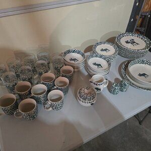 Full 8 place setting of Tienshen Moose pattern.  Very rare.